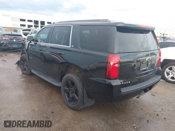 2017 Chevrolet Tahoe LT with VIN 1GNSKBKC9HR315531, listed as a IAAI auction lot 42898425 with 91,110 mi miles and . Bid and sale history available at DreamBid. Image 3.