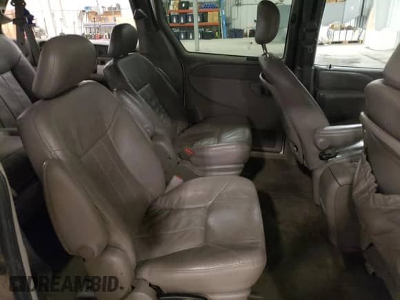 2002 Dodge Caravan ES z VIN 2B4GP54LX2R575496, wystawiony jako Copart lot #79402444 z przebiegiem 229 053 mil mil oraz Nie do naprawy • Non repairable. Historia ofert i sprzedaży dostępna na DreamBid. Obrazek 12.