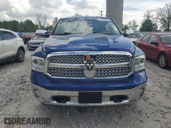 2014 Ram 1500 Laramie z VIN 1C6RR7VM0ES387931, wystawiony jako Copart lot #56866025 z przebiegiem 149 710 mil mil oraz Czysty tytuł • Clean title. Historia ofert i sprzedaży dostępna na DreamBid. Obrazek 5.
