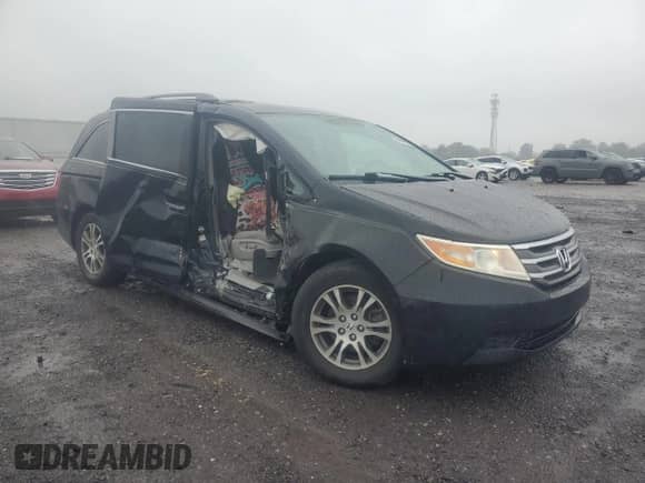 2013 Honda Odyssey EX-L с VIN 5FNRL5H63DB042867, выставлен на аукционе Copart как лот 81099535 с пробегом 186 662 миль миль и Чистый • Clean title. История ставок и продаж доступна на DreamBid. Изображение 4.