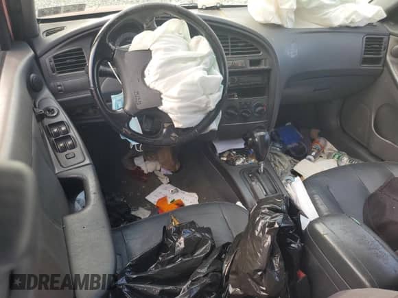 2003 Hyundai Elantra GT with VIN KMHDN55D93U080547, listed as a Copart auction lot 65409295 with Not provided miles and Salvage title. Bid and sale history available at DreamBid. Image 8.