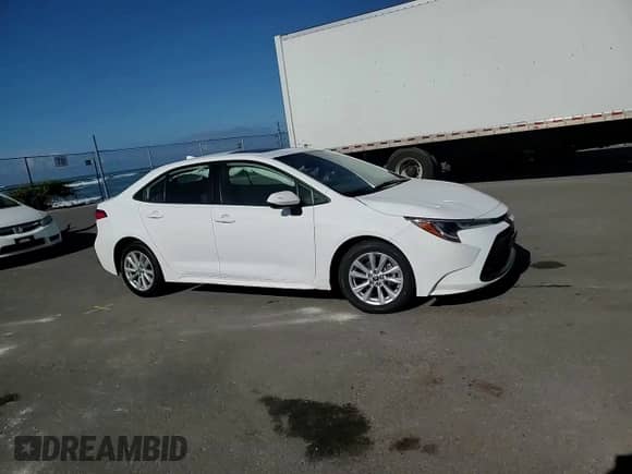 2024 Toyota Corolla LE z VIN JTDB4MEE4RJ015021, wystawiony jako Copart lot #68391975 z przebiegiem 11 912 mil mil oraz Szkoda całkowita • Salvage title. Historia ofert i sprzedaży dostępna na DreamBid. Obrazek 13.