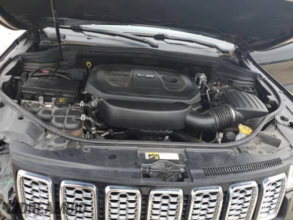 2017 Jeep Grand Cherokee Overland with VIN 1C4RJFCG8HC940430, listed as a Copart auction lot 68780995 with 150,371 mi miles and Salvage title. Bid and sale history available at DreamBid. Image 12.