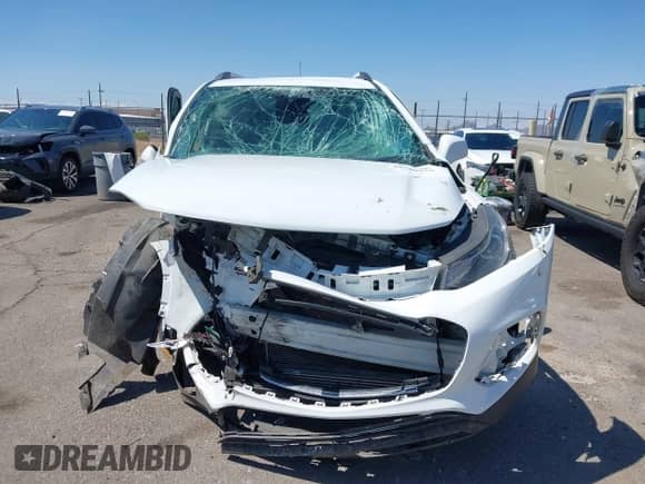 2017 Chevrolet Trax LT with VIN KL7CJLSB8HB140157, listed as a IAAI auction lot 43249110 with 112,539 mi miles and . Bid and sale history available at DreamBid. Image 13.