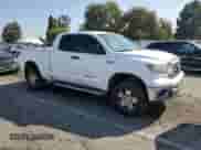 2007 Toyota Tundra SR5 z VIN 5TFBV54167X027182, wystawiony jako Copart lot #89721585 z przebiegiem 166 764 mil mil oraz Szkoda całkowita • Salvage title. Historia ofert i sprzedaży dostępna na DreamBid. Obrazek 4.