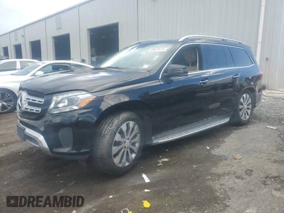 2017 Mercedes-Benz GLS 450 z VIN 4JGDF6EE3HA810036, wystawiony jako Copart lot #68623615 z przebiegiem 185 042 mil mil oraz Czysty tytuł • Clean title. Historia ofert i sprzedaży dostępna na DreamBid. Obrazek 1.