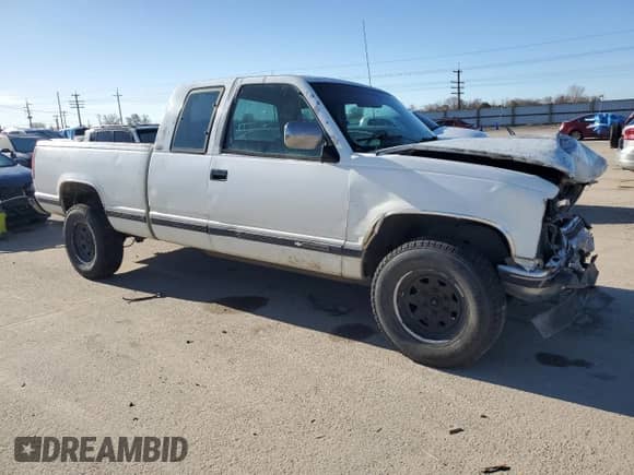 1994 Chevrolet Silverado 2500 with VIN 2GCFK29K9R1129148, listed as a Copart auction lot 46867115 with 441,778 mi miles and Salvage title. Bid and sale history available at DreamBid. Image 4.