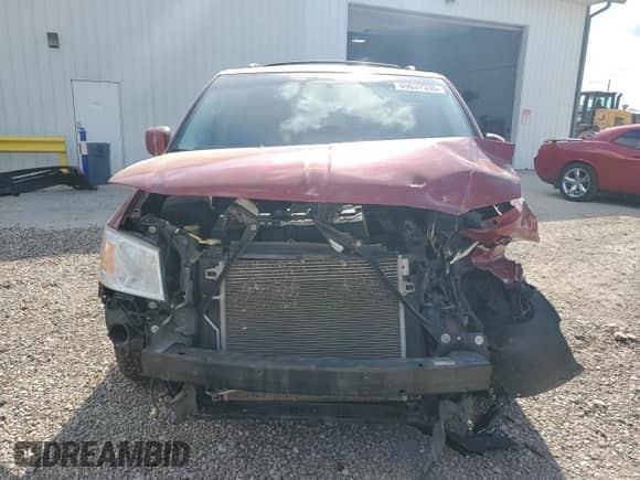 2010 Dodge Grand Caravan SXT with VIN 2D4RN5DX5AR125907, listed as a Copart auction lot 69637335 with 211,789 mi miles and Salvage title. Bid and sale history available at DreamBid. Image 5.