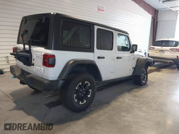 2024 Jeep Wrangler Rubicon с VIN 1C4RJXR60RW292764, выставлен на аукционе IAAI как лот 42761185 с пробегом 34 298 миль миль и . История ставок и продаж доступна на DreamBid. Изображение 4.