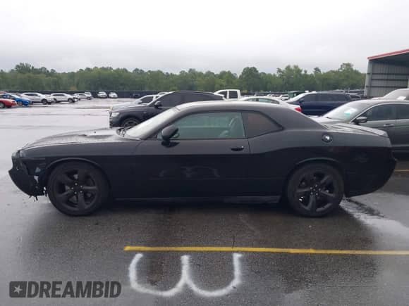 2013 Dodge Challenger R/T с VIN 2C3CDYBT5DH614393, выставлен на аукционе IAAI как лот 42855411 с пробегом 156 283 миль миль и . История ставок и продаж доступна на DreamBid. Изображение 14.