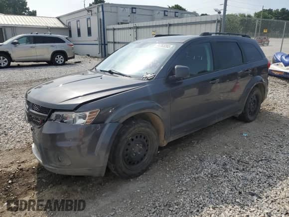 2017 Dodge Journey SXT with VIN 3C4PDDBG3HT618254, listed as a Copart auction lot 64763265 with 118,756 mi miles and Salvage title. Bid and sale history available at DreamBid. Image 1.