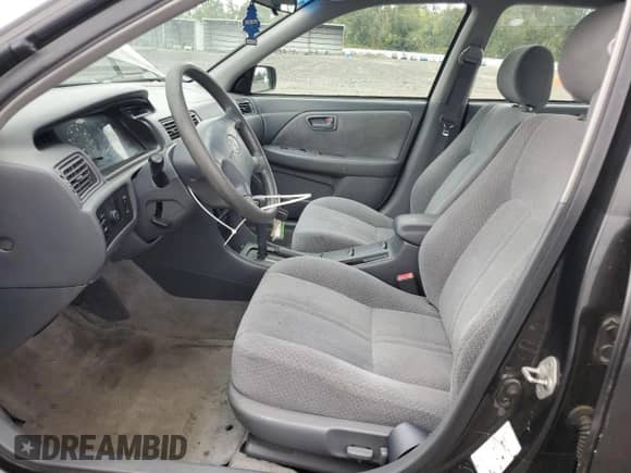 2001 Toyota Camry CE с VIN JT2BG22K510578541, выставлен на аукционе Copart как лот 72061075 с пробегом 218 624 миль миль и Списание • Salvage title. История ставок и продаж доступна на DreamBid. Изображение 7.