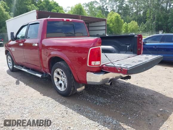 2013 Ram 1500 Laramie with VIN 1C6RR6NT8DS578514, listed as a IAAI auction lot 42635075 with 158,820 mi miles and . Bid and sale history available at DreamBid. Image 3.