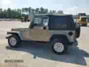 2005 Jeep Wrangler X с VIN 1J4FA39S25P301939, выставлен на аукционе Copart как лот 62480995 с пробегом 205 441 миль миль и Списание • Salvage title. История ставок и продаж доступна на DreamBid. Изображение 2.