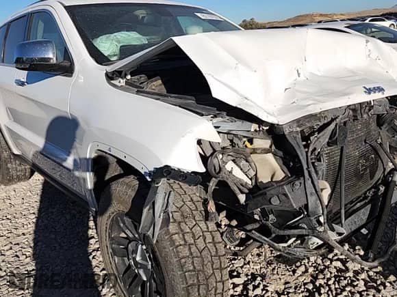 2014 Jeep Grand Cherokee Limited с VIN 1C4RJFBT3EC162600, выставлен на аукционе Copart как лот 81197575 с пробегом 152 703 миль миль и Списание • Salvage title. История ставок и продаж доступна на DreamBid. Изображение 13.