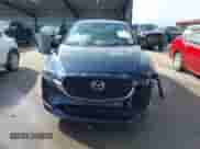 2025 Mazda CX-5 S Select z VIN JM3KFBBL9S0668223, wystawiony jako IAAI lot #43131761 z przebiegiem 4 274 mil mil oraz . Historia ofert i sprzedaży dostępna na DreamBid. Obrazek 12.