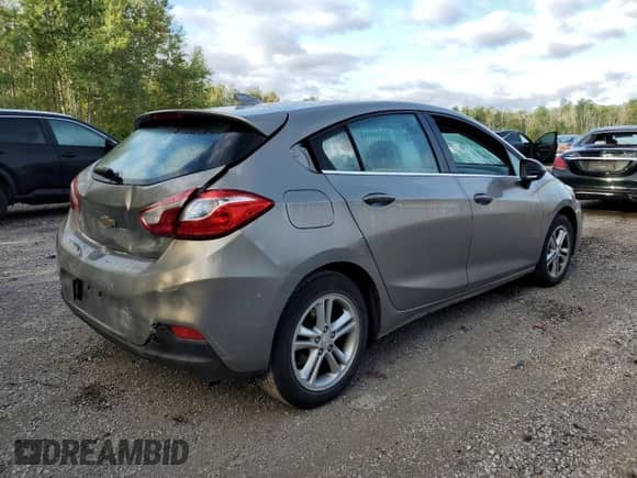 2017 Chevrolet Cruze LT с VIN 3G1BE6SM5HS562034, выставлен на аукционе Copart как лот 71134115 с пробегом 115 693 миль миль и Списание • Salvage title. История ставок и продаж доступна на DreamBid. Изображение 3.