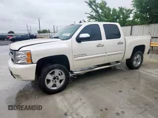 2011 Chevrolet Silverado 1500 LTZ with VIN 3GCPCTE03BG390865, listed as a Copart auction lot 60490745 with 180,162 mi miles and Salvage title. Bid and sale history available at DreamBid. Image 1.