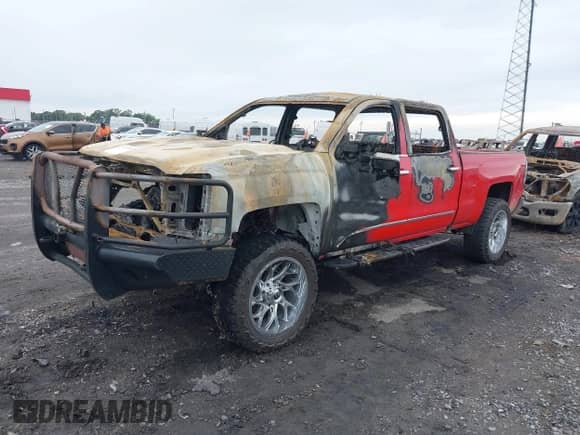 2016 Chevrolet Silverado 2500HD LTZ z VIN 1GC1KWE89GF270352, wystawiony jako IAAI lot #43078955 z przebiegiem Nie podano mil oraz . Historia ofert i sprzedaży dostępna na DreamBid. Obrazek 2.