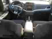 2013 Dodge Journey SE z VIN 3C4PDCAB1DT721733, wystawiony jako Copart lot #69377584 z przebiegiem 130 587 mil mil oraz Szkoda całkowita • Salvage title. Historia ofert i sprzedaży dostępna na DreamBid. Obrazek 8.