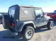 1997 Jeep Wrangler SE with VIN 1J4FY29P9VP452231, listed as a IAAI auction lot 43459509 with Not provided miles and . Bid and sale history available at DreamBid. Image 4.