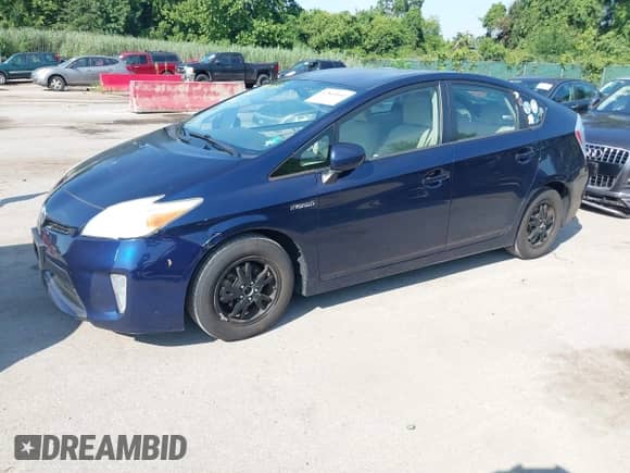 2012 Toyota Prius Three with VIN JTDKN3DU4C1484049, listed as a IAAI auction lot 42860660 with 212,791 mi miles and . Bid and sale history available at DreamBid. Image 2.