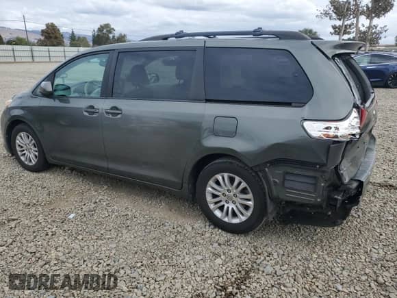 2013 Toyota Sienna XLE with VIN 5TDYK3DC7DS314816, listed as a Copart auction lot 81985845 with 105,952 mi miles and Salvage title. Bid and sale history available at DreamBid. Image 2.