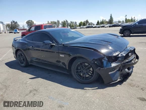 2021 Ford Mustang GT с VIN 1FA6P8CF6M5148320, выставлен на аукционе Copart как лот 71417825 с пробегом 51 128 миль миль и Списание • Salvage title. История ставок и продаж доступна на DreamBid. Изображение 4.
