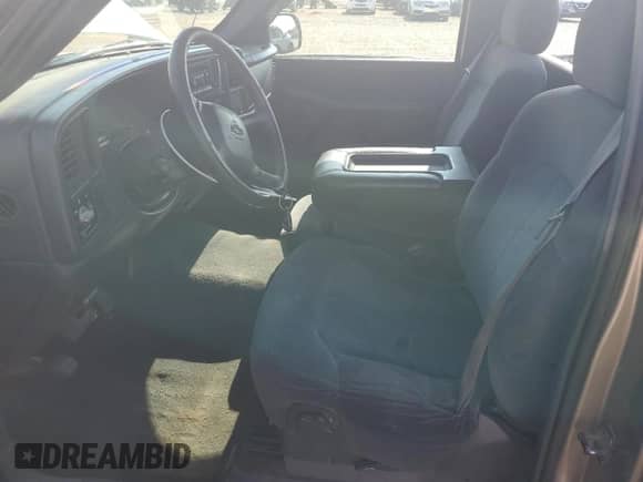 2000 Chevrolet Silverado 1500 LS with VIN 1GCEC14V6YE100403, listed as a Copart auction lot 70000125 with 208,594 mi miles and Salvage title. Bid and sale history available at DreamBid. Image 7.