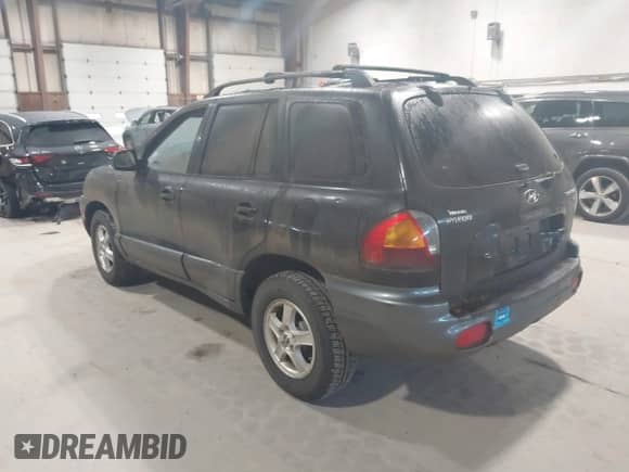 2004 Hyundai Santa Fe GLS z VIN KM8SC13D84U761129, wystawiony jako IAAI lot #43472608 z przebiegiem 169 294 mil mil oraz . Historia ofert i sprzedaży dostępna na DreamBid. Obrazek 3.