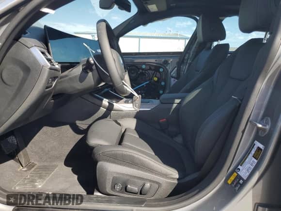 2025 BMW i4 xDrive40 with VIN WBY43HD05SFU20563, listed as a Copart auction lot 85369775 with 3,356 mi miles and Salvage title. Bid and sale history available at DreamBid. Image 7.