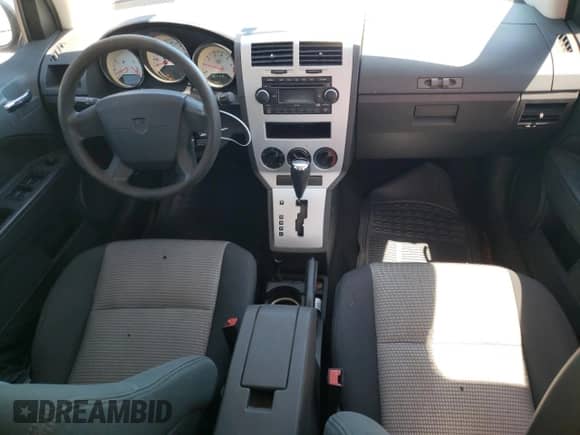 2008 Dodge Caliber SXT с VIN 1B3HB48B28D548730, выставлен на аукционе Copart как лот 61416144 с пробегом 206 468 миль миль и Списание • Salvage title. История ставок и продаж доступна на DreamBid. Изображение 8.