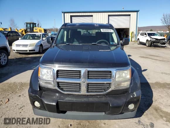 2009 Dodge Nitro SXT с VIN 1D8GU28K99W542939, выставлен на аукционе Copart как лот 80309074 с пробегом 242 461 миль миль и Списание • Salvage title. История ставок и продаж доступна на DreamBid. Изображение 5.