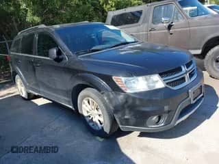 2013 Dodge Journey SXT with VIN 3C4PDCBB5DT585847, listed as a IAAI auction lot 43145564 with 191,954 mi miles and . Bid and sale history available at DreamBid. Image 1.