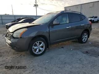 2010 Nissan Rogue SL with VIN JN8AS5MT0AW013009, listed as a Copart auction lot 69099655 with 106,273 mi miles and Salvage title. Bid and sale history available at DreamBid. Image 1.