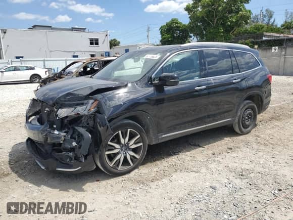 2022 Honda Pilot Touring 7-Passenger z VIN 5FNYF6H60NB098503, wystawiony jako Copart lot #52719825 z przebiegiem 45 765 mil mil oraz Szkoda całkowita • Salvage title. Historia ofert i sprzedaży dostępna na DreamBid. Obrazek 1.