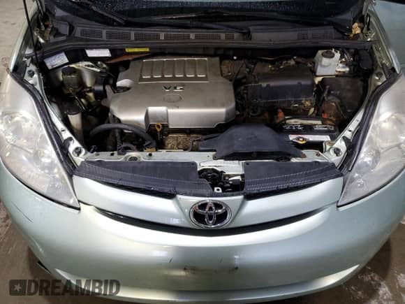 2010 Toyota Sienna CE z VIN 5TDKK4CC4AS315740, wystawiony jako Copart lot #82469755 z przebiegiem 256 689 mil mil oraz Czysty tytuł • Clean title. Historia ofert i sprzedaży dostępna na DreamBid. Obrazek 12.