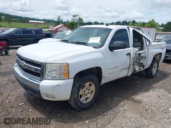 2007 Chevrolet Silverado 1500 1LT z VIN 3GCEK13M27G503233, wystawiony jako IAAI lot #42487465 z przebiegiem 220 704 mil mil oraz . Historia ofert i sprzedaży dostępna na DreamBid. Obrazek 6.