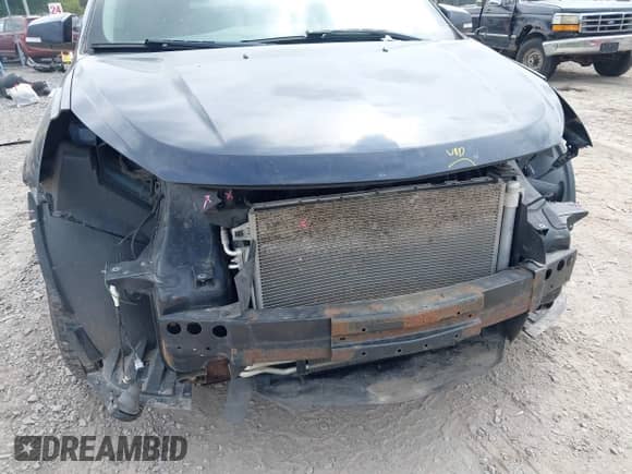 2015 Chevrolet Traverse LT z VIN 1GNKVGKD1FJ287734, wystawiony jako IAAI lot #43018247 z przebiegiem 155 457 mil mil oraz . Historia ofert i sprzedaży dostępna na DreamBid. Obrazek 6.