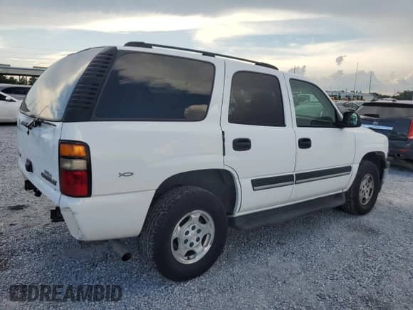 2005 Chevrolet Tahoe LS с VIN 1GNEC13T45R220390, выставлен на аукционе Copart как лот 64190025 с пробегом 145 274 миль миль и Списание • Salvage title. История ставок и продаж доступна на DreamBid. Изображение 3.