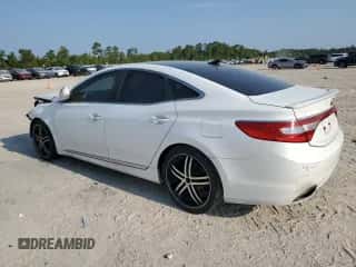 2013 Hyundai Azera с VIN KMHFH4JG4DA233042, выставлен на аукционе Copart как лот 66947014 с пробегом 176 177 миль миль и Чистый • Clean title. История ставок и продаж доступна на DreamBid. Изображение 2.