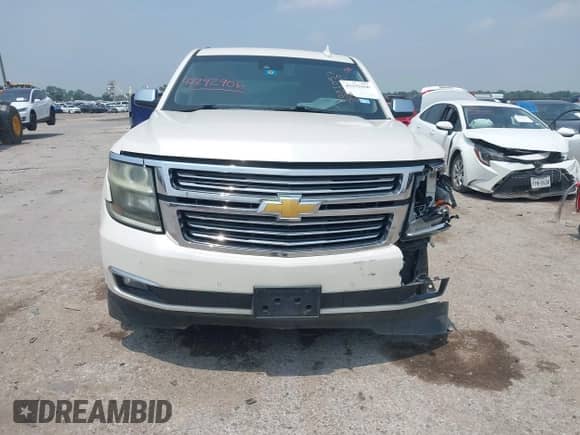 2015 Chevrolet Tahoe LTZ with VIN 1GNSCCKC8FR522850, listed as a IAAI auction lot 42292906 with 225,673 mi miles and . Bid and sale history available at DreamBid. Image 13.