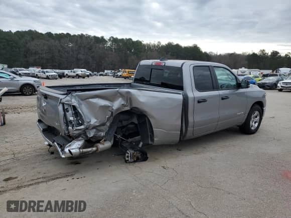 2023 Ram 1500 Big Horn with VIN 1C6SRFBT7PN678841, listed as a Copart auction lot 60423115 with 2,755 mi miles and Salvage title. Bid and sale history available at DreamBid. Image 3.