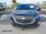 2021 Chevrolet Equinox Premier with VIN 2GNAXNEV1M6158448, listed as a IAAI auction lot 43387463 with 37,488 mi miles and . Bid and sale history available at DreamBid. Image 6.