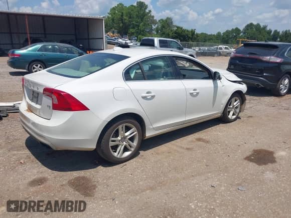 2015 Volvo S60 T5 Drive-E Premier with VIN YV140MFK3F1362760, listed as a IAAI auction lot 42834933 with 158,228 mi miles and . Bid and sale history available at DreamBid. Image 4.