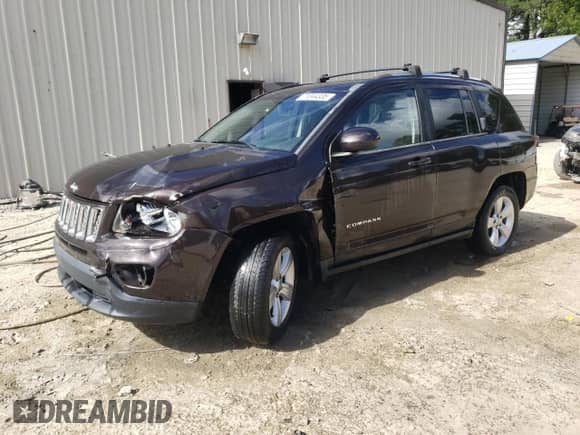 2014 Jeep Compass Latitude with VIN 1C4NJCEA4ED643134, listed as a Copart auction lot 71044335 with 103,025 mi miles and Salvage title. Bid and sale history available at DreamBid. Image 1.