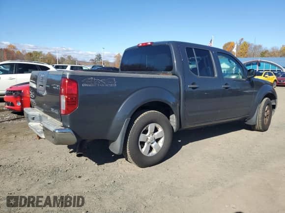 2010 Nissan Frontier LE with VIN 1N6AD0EV7AC427265, listed as a Copart auction lot 86555295 with 179,428 mi miles and Clean title. Bid and sale history available at DreamBid. Image 3.