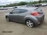 2014 Hyundai Veloster z VIN KMHTC6AD0EU196106, wystawiony jako Copart lot #69494305 z przebiegiem 102 472 mil mil oraz Szkoda całkowita • Salvage title. Historia ofert i sprzedaży dostępna na DreamBid. Obrazek 2.
