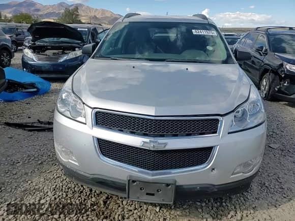 2011 Chevrolet Traverse LS z VIN 1GNKVEED9BJ101979, wystawiony jako Copart lot #82411975 z przebiegiem 159 074 mil mil oraz Szkoda całkowita • Salvage title. Historia ofert i sprzedaży dostępna na DreamBid. Obrazek 14.