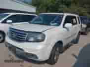 2015 Honda Pilot Touring с VIN 5FNYF3H92FB007774, выставлен на аукционе IAAI как лот 43083627 с пробегом 148 676 миль миль и . История ставок и продаж доступна на DreamBid. Изображение 2.